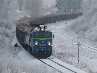 31.12.2009, Ełk. ST44-1225 z pociągiem relacji Grajewo - Ełk - Szczecinek wyjeżdża ze stacji Ełk
