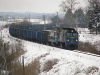 10.02.2013, Siedliska koło Ełku, ST44-1231 ciągnie ET22-600 oraz wagony relacji Kwidzyn-Sokółka, ujęcie pierwsze