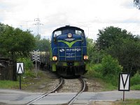 21.07.2012, Ełk Szyba Zachód, SM42-522 z pociągiem Skarżysko Kamienna - Szczytno zbliża się do przystanku. Jest to kolejny tego dnia transport szyn na potrzeby remontu odcinka Olsztyn-Szczytno.