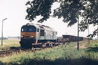 25.07.2003, przystanek Siedliska, ST44-957 z poc. TKMSc 763 Ełk - Giżycko