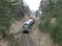 29.03.2010, za Mrągowem, pociąg TKPSc 900371 relacji Olsztyn Główny - Orzysz, prowadzi SM42-1110, na popychu SU46-010