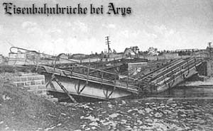 Wysadzone mosty kolejowe na Orzyszy, na pierwszym planie most linii Orzysz-Giycko. Pocztwka z 1915 roku.