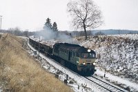27.12.2000, przed stacją Stare Juchy, ST44-668 z pociągiem Ełk-Giżycko, w planie zdawczego tej relacji